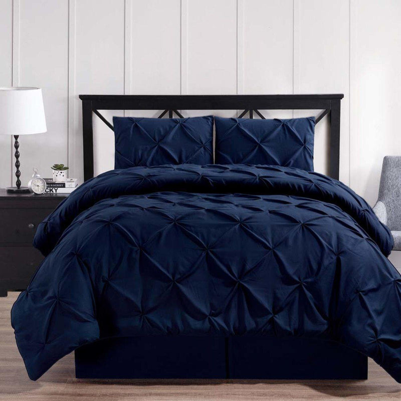 https://www.wholesalebeddings.com/cdn/shop/products/Navy-Oxford-Double-Needle-Luxury-Soft-Pinch-Pleated-Comforter-Set-Comforter-Sets_57903557-ad99-447e-abac-14453fde73e1_800x.jpg?v=1641604227